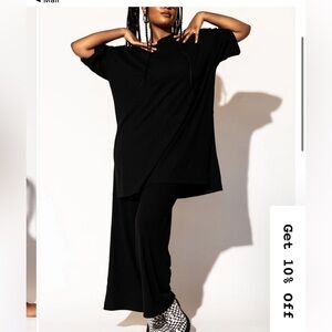 Dressed in LALA Leveled up ribbed playsuit in black